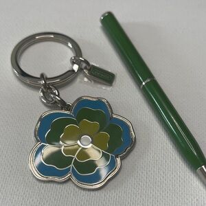 Green and Blue Floral Keychain by Coach and a Green Coach Pen